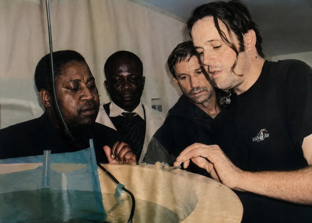 The Minister of Fisheries inspecting oyster spat at the hatchery